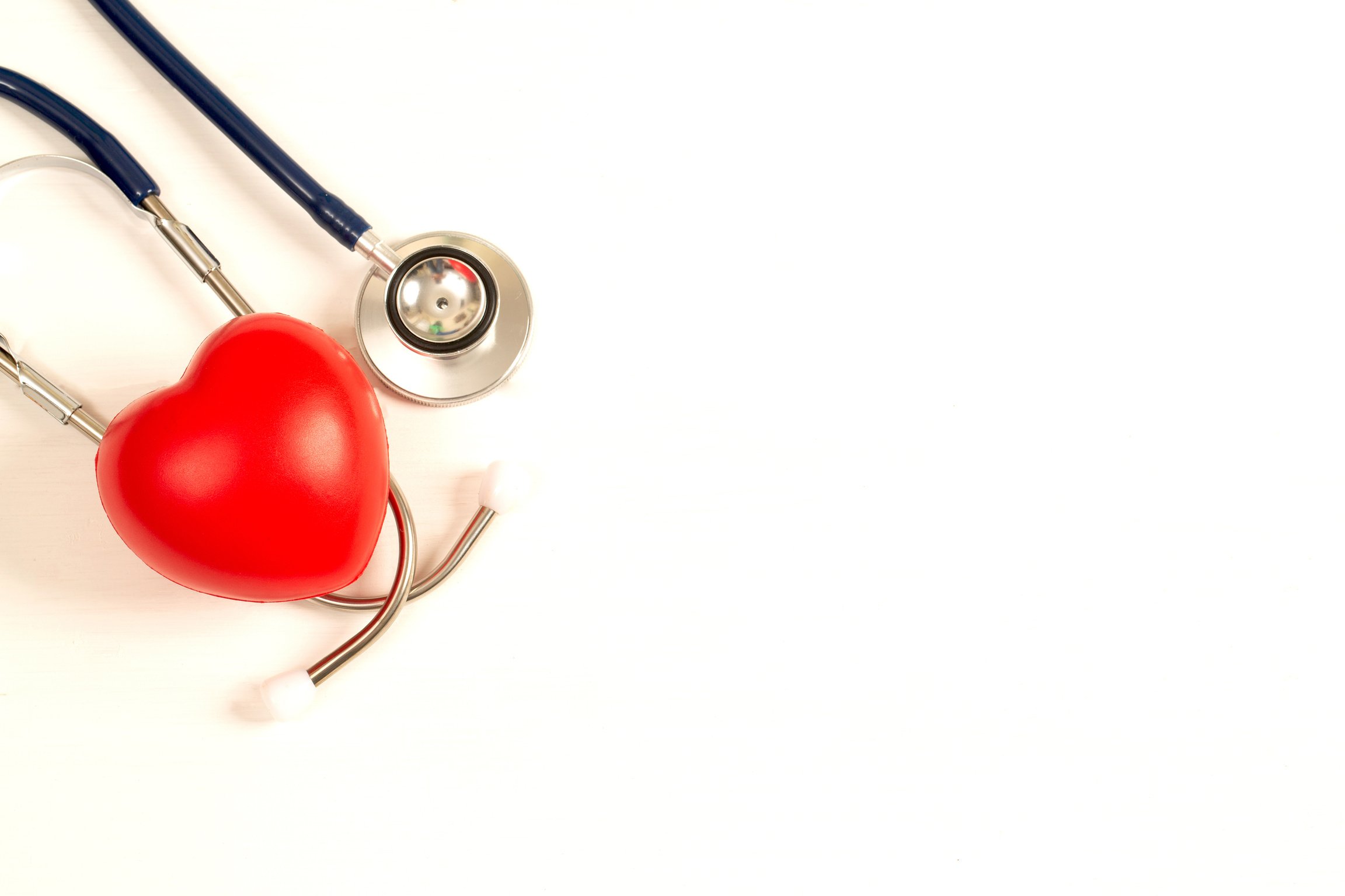 stethoscope and heart on white background, heart health care