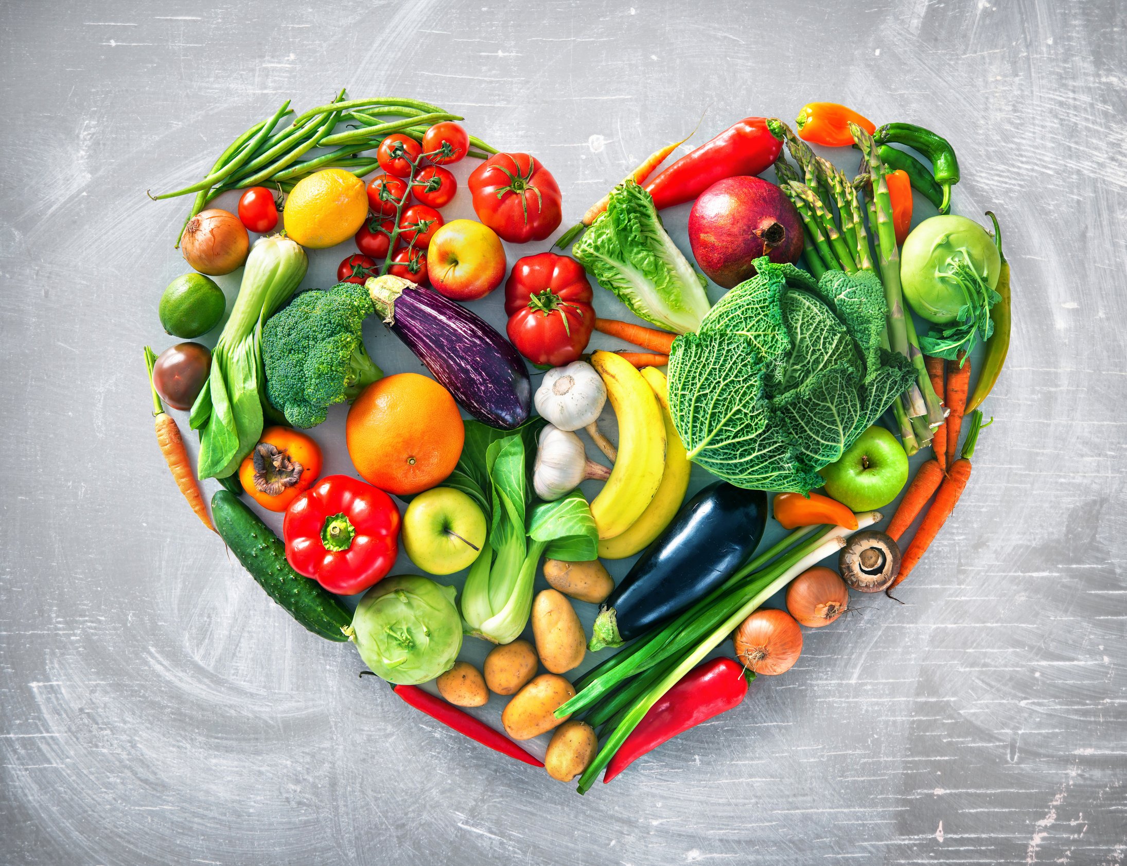 Heart shape by various vegetables and fruits